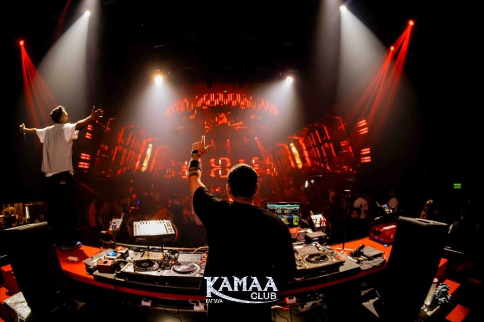 DJ performing to a cheering crowd under red lights at Kamaa Club Pattaya
