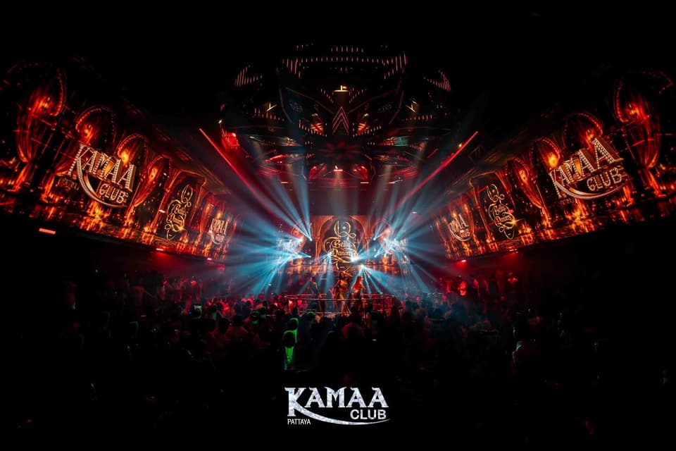 Main room glowing red and blue under the stage lights at Kamaa Club Pattaya