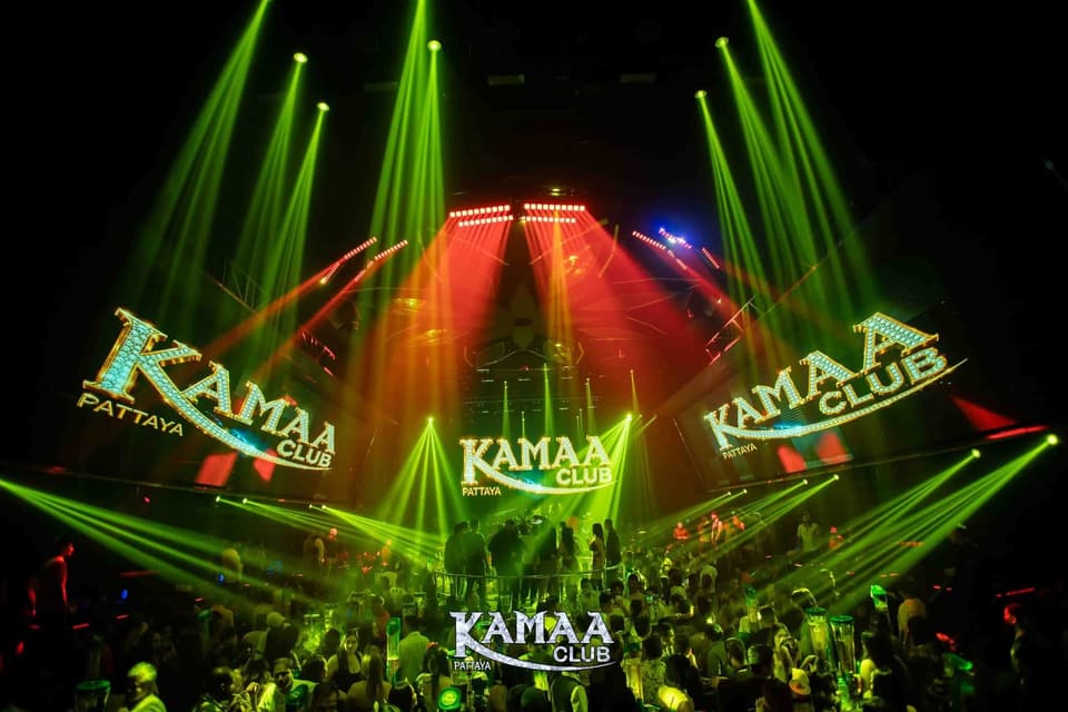 Green beams and Kamaa logos above the dance floor at Kamaa Club Pattaya