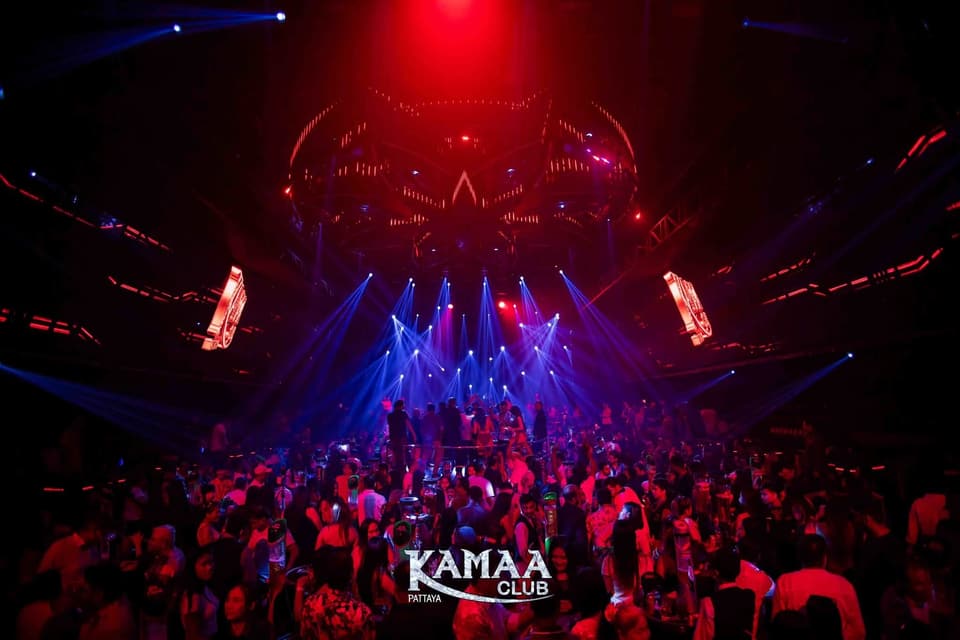 Crowd dancing under red and blue lights at Kamaa Club Pattaya