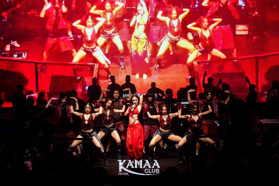 Dance troupe performing on a red-lit stage at Kamaa Club Pattaya