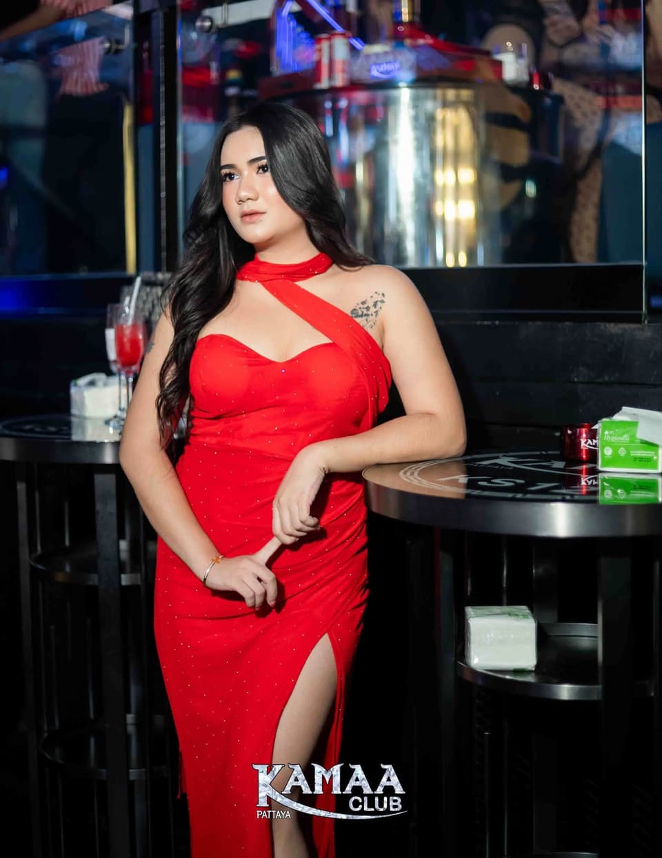 Guest in a red dress at the bar at Kamaa Club Pattaya