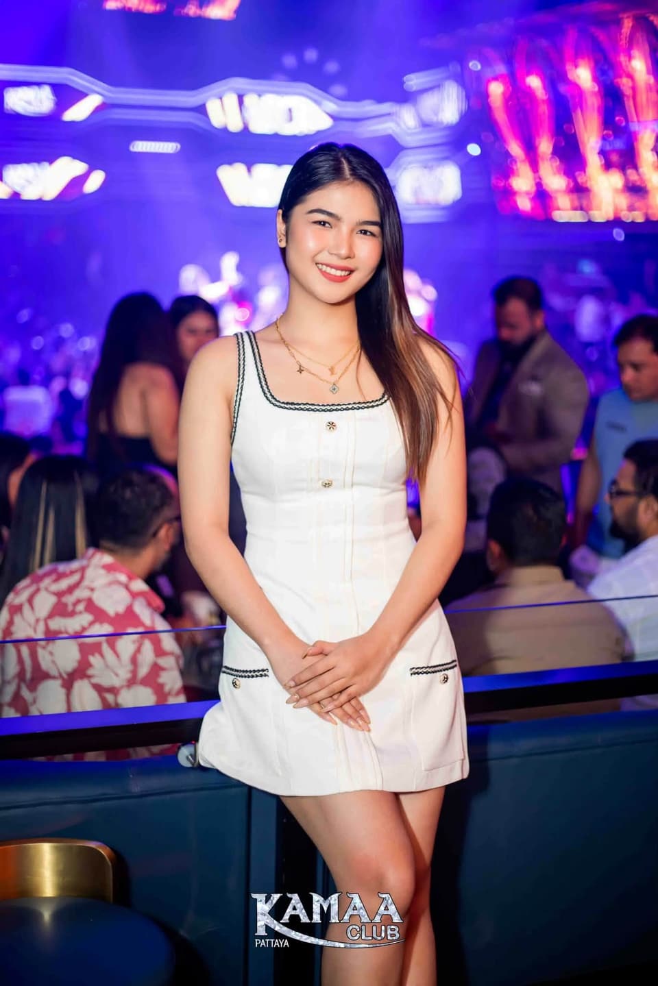 Guest in a white dress in front of the crowd at Kamaa Club Pattaya