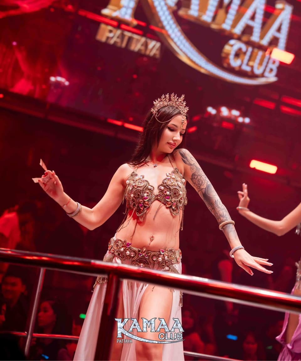 Belly dancer in a jewelled costume performing on stage at Kamaa Club Pattaya