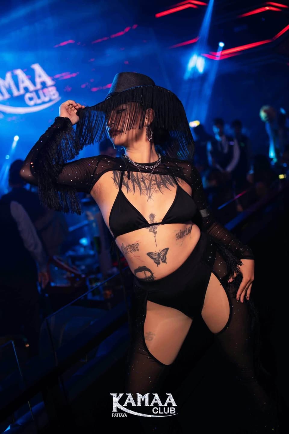 Performer in a black hat and fringed outfit at Kamaa Club Pattaya